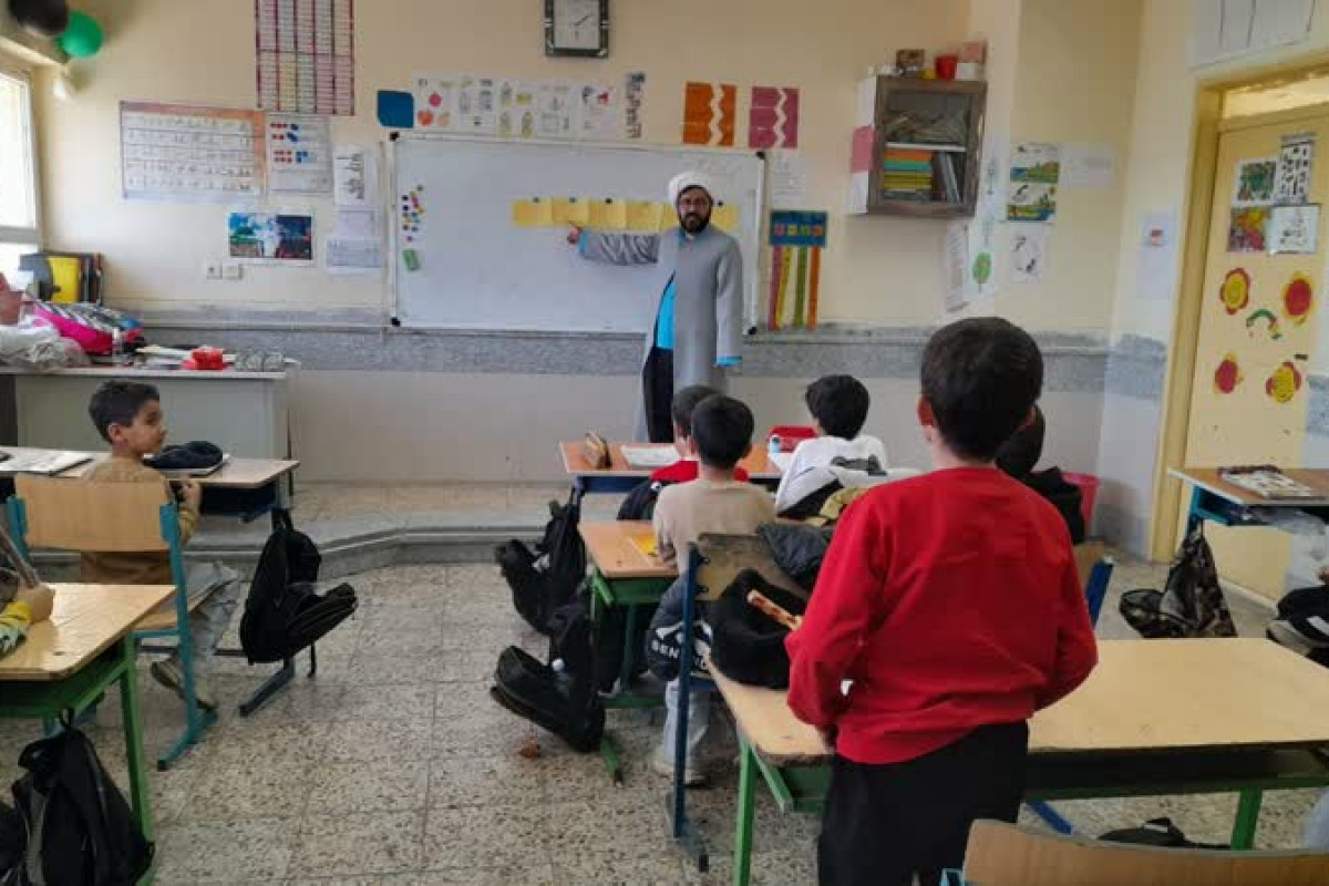 برگزاری طرح زندگی با آیه ها در  مدرسه شهید اشرفی اصفهانی شهرستان ملکشاهی